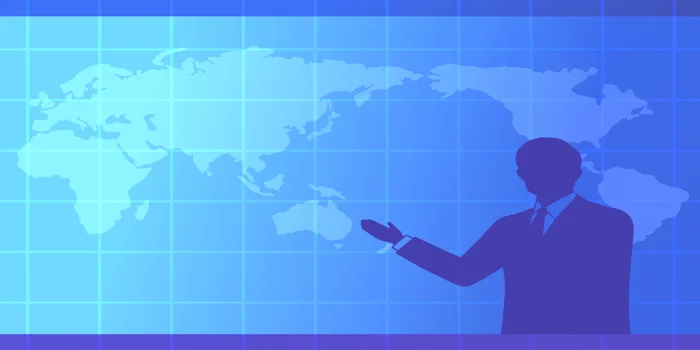 世界地図と男性のシルエット