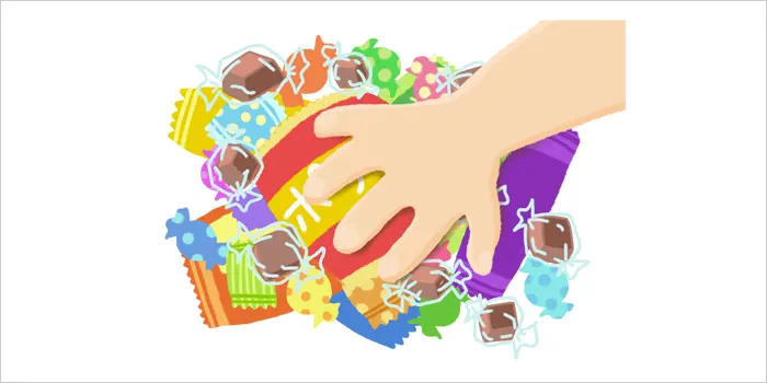 お菓子をつかんでいる手のイラスト