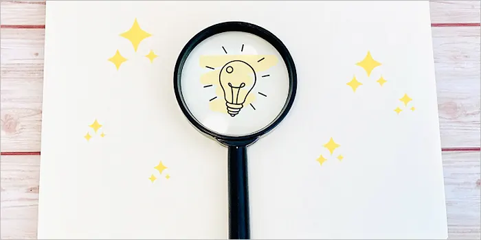 電球のマークと虫眼鏡